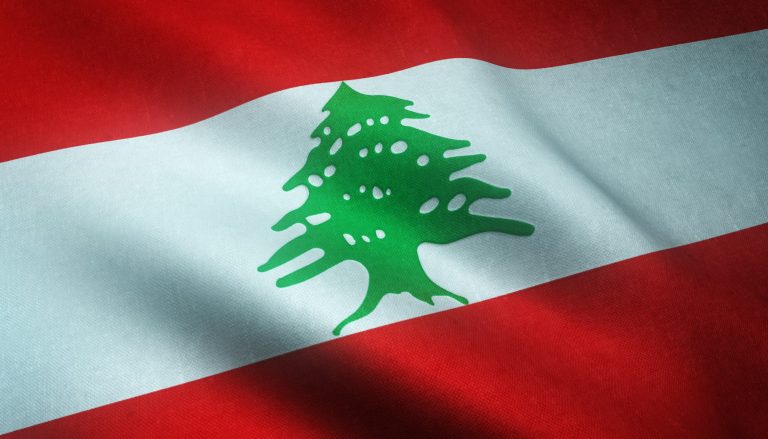 Closeup shot of the waving flag of Lebanon with interesting textures