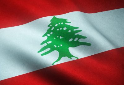 Closeup shot of the waving flag of Lebanon with interesting textures