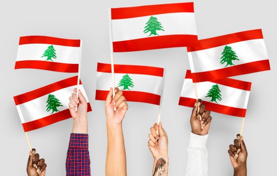 hands-waving-flags-lebanon