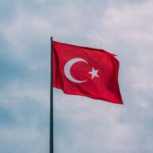 A vertical shot of the Turkey flag  floating in the air